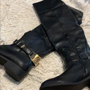 Used women knee high boots